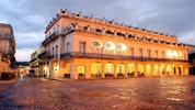 This is an exterior view of the Santa Isabel Hotel (est. 1867) and the Plaza de Armas, a main tourist square, on September 4, 2004 in old Havana, Cuba. (Photo by Sven Creutzmann/Mambo Photography/Getty Images)